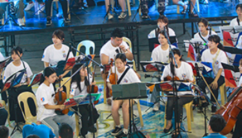 UUU Orchestra performs for PAREF Springdale School